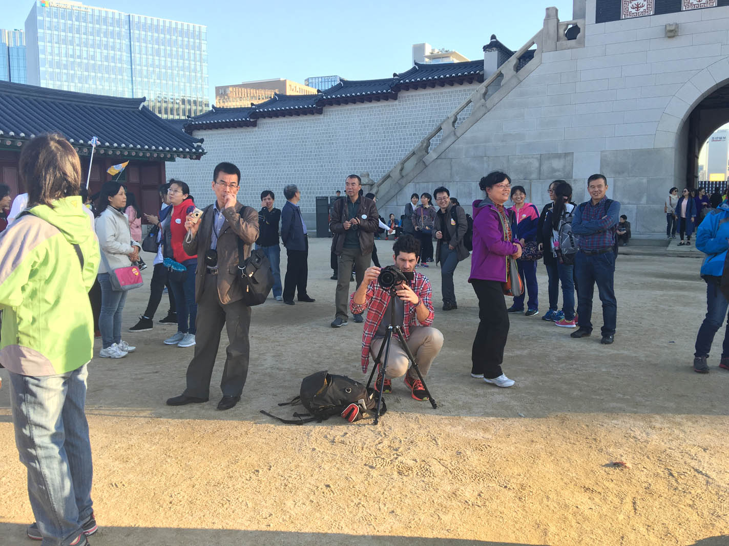 Scott reviewing an image in Gyeongbokgung, Seoul, with crowds as a reference for reference image for Hyperlapse VS Timelapse