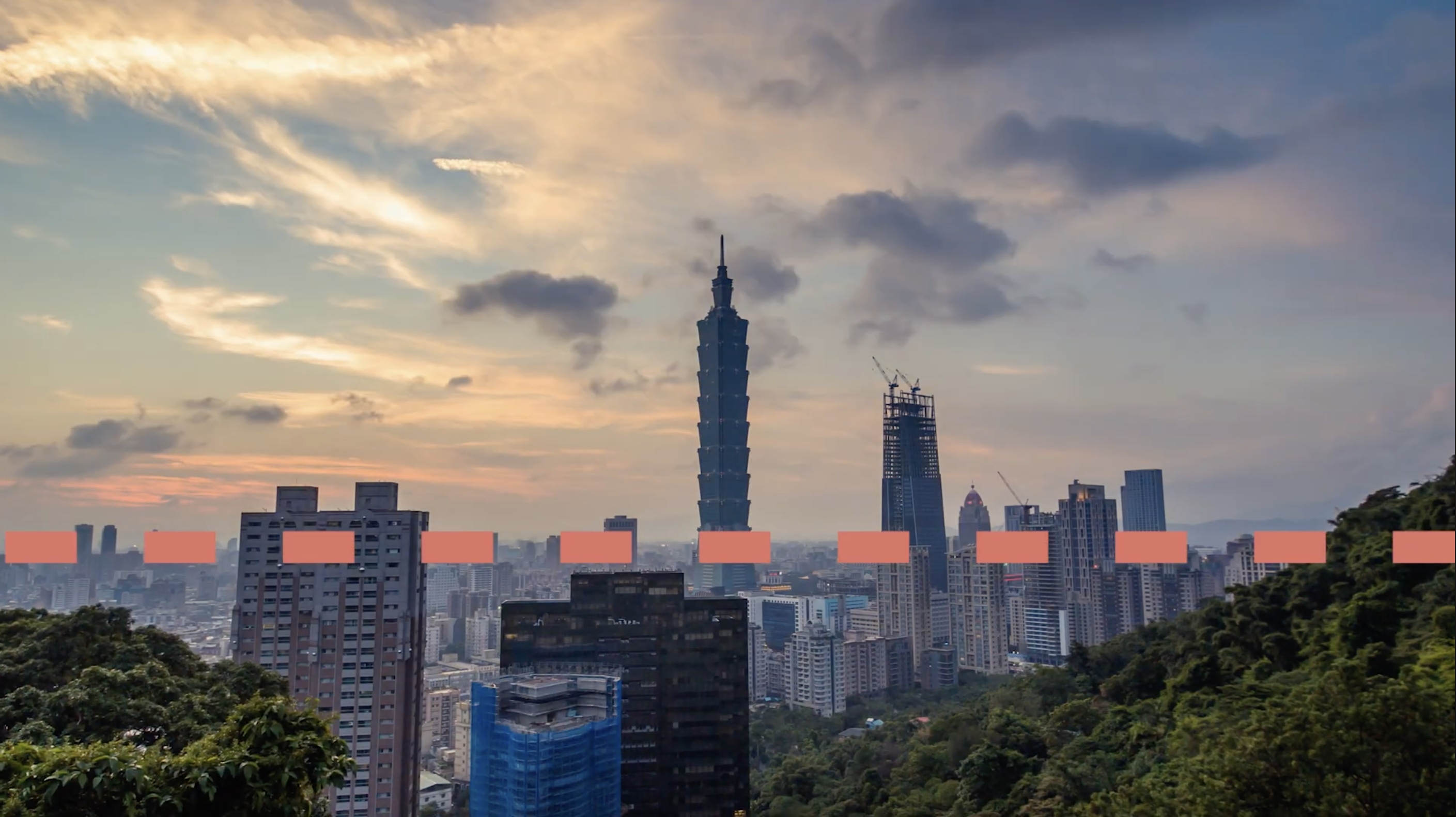 The Skyline in Taipei, Taiwan during Sunset using a dashed line to indicate good composition rules for a time lapse or hyperlapse.